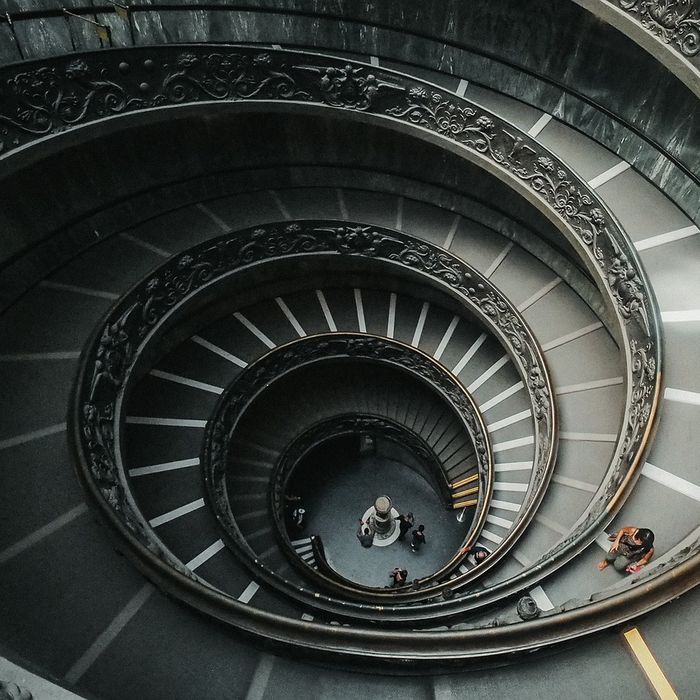 Looking down the centre of a spiral staircase